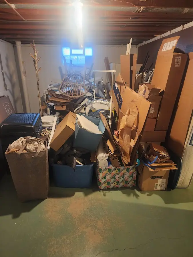 Roll-off dumpster container at job site for Yard Waste Dumpster Rental in Bristol